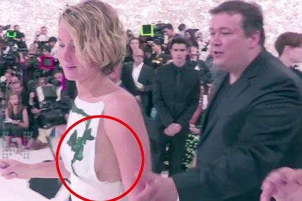 Jennifer Lawrence suffers wardrobe malfunction at the Paris Fashion Week