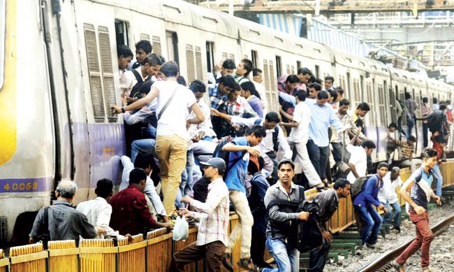 Automatic sliding doors are a must on local trains to avoid scenarios like this. File pic