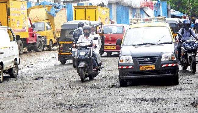 mid-day measured over 180 potholes on the entire 500-metre stretch of the road