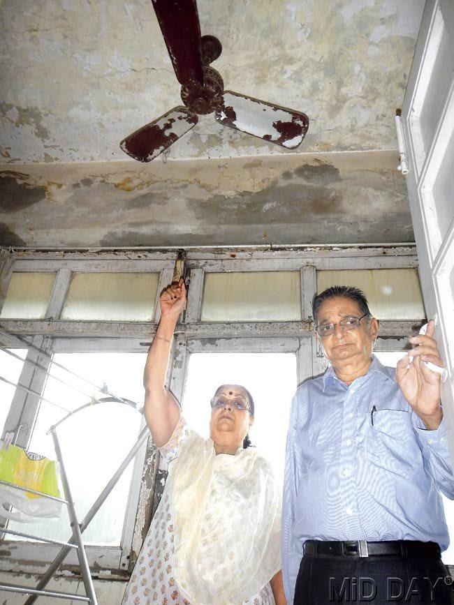 Geeta and Krishnakanth P Mehta show their balcony ceiling at Jethwa Niwas, which is in a bad condition