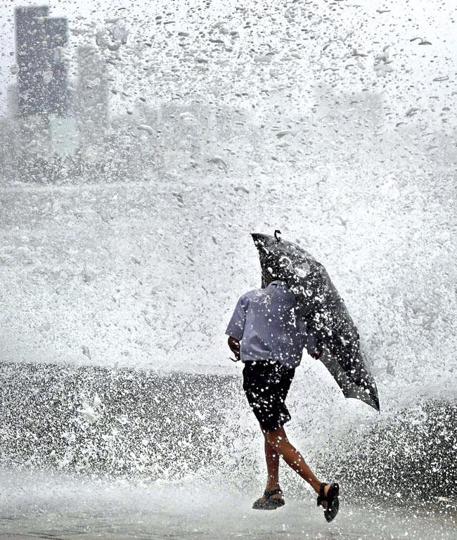 On Monday, Colaba recorded 9.6 mm and Santacruz recorded 12.2 mm rainfall. Pic/PTI