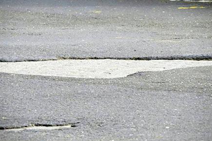 PWD begins temporary repairs of potholes on WEH