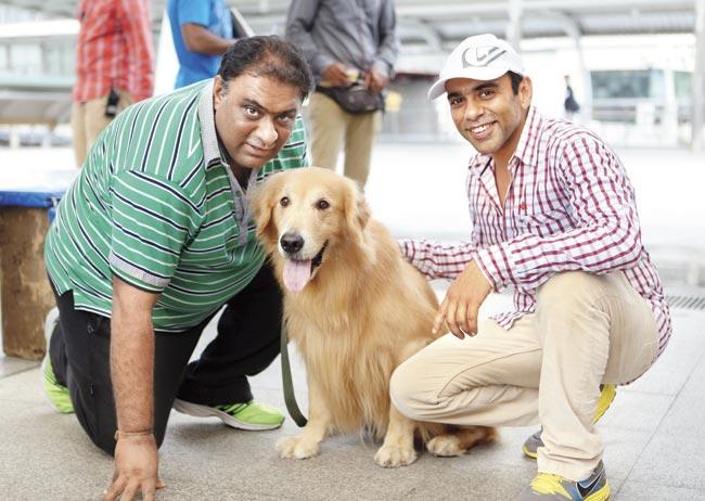 Director duo Sajid (left) and Farhad pose with Junior on the sets of the film Entertainment