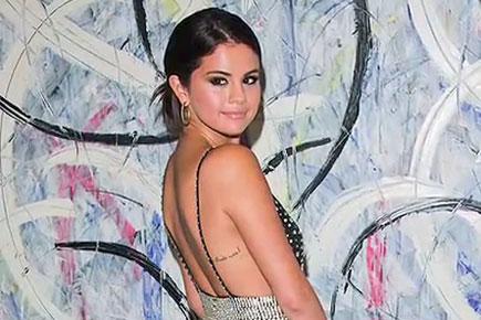 Selena Gomez flaunts new tattoo at Oschia Festival red carpet 