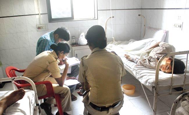 Police recording a panchnama at Suchak Hospital in Malad where the victim is being treated