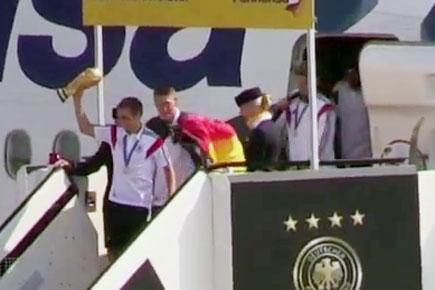 FIFA World Champions team Germany arrive with trophy in Berlin