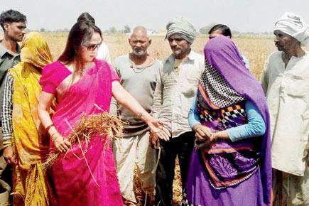Hema Malini interacts with villagers in Mathura