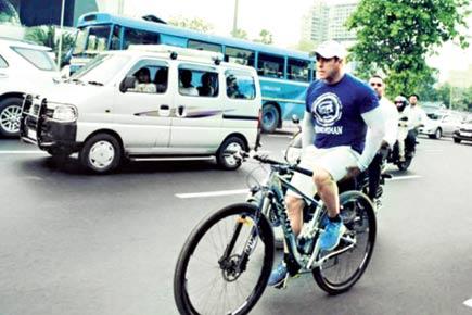 Salman Khan rides bicycle in Mumbai without holding handlebars!