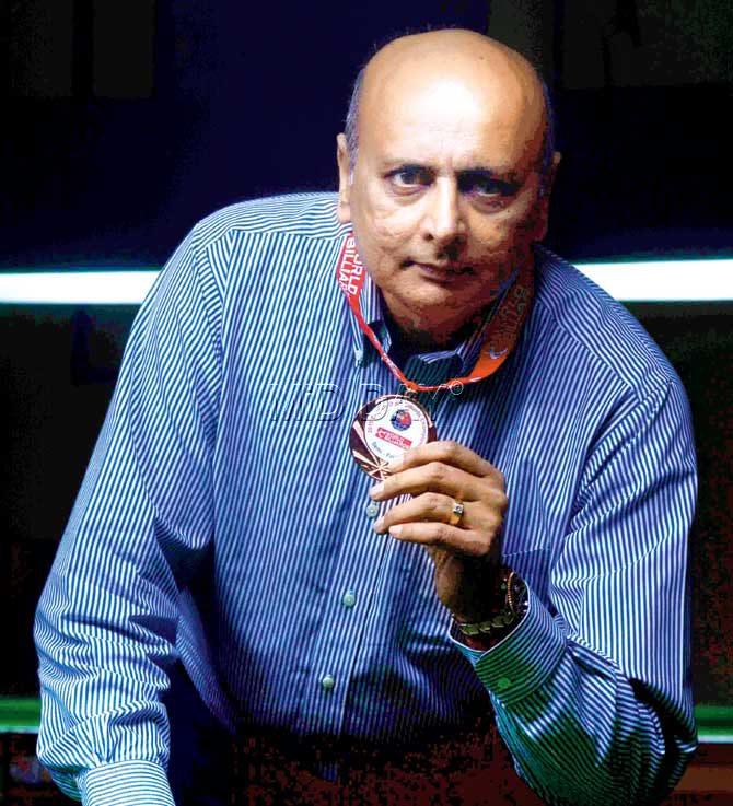 Nalin Patel poses with his English Open Billiards Championship bronze medal at the Bombay Gymkhana yesterday. Pic/Atul Kamble