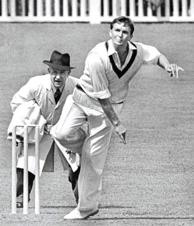 Richie Benaud in action against on the MCC at Brisbane on Dec 5, 1958. PIC/GETTY IMAGES