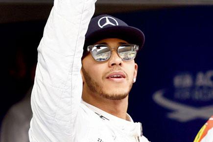 Hat-trick of pole positions for Lewis Hamilton