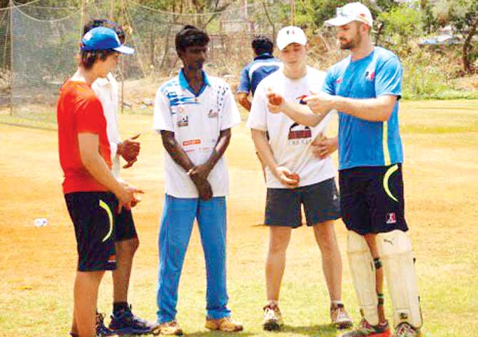 Former Australian spinner Jason Krejza (right) training youngsters in Kandivli yesterday