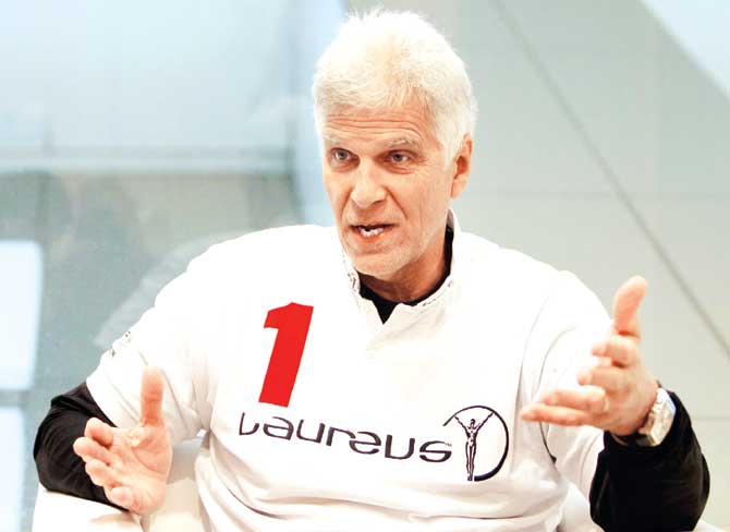 Swimming golden great Mark Spitz speaks in Shanghai yesterday. Pic/Getty Images