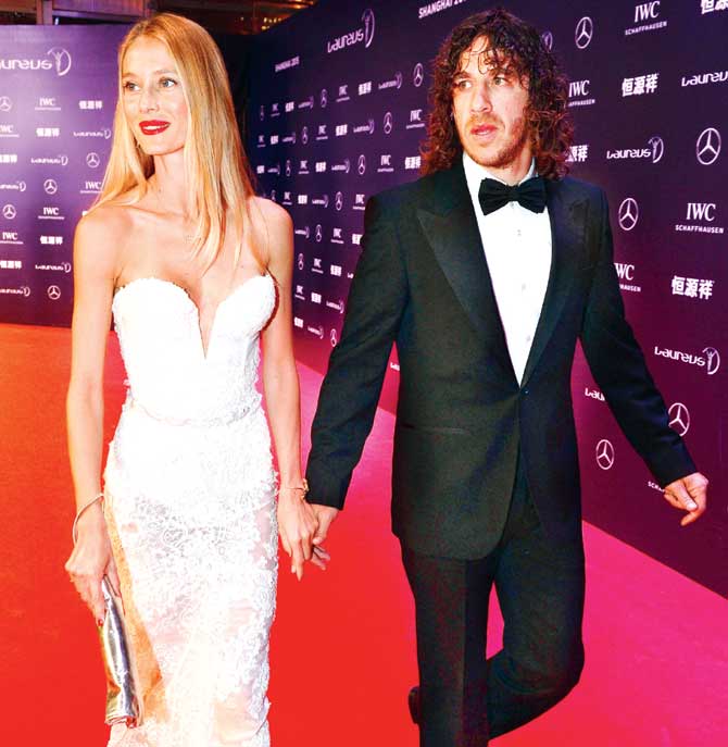 Model Vanessa Lorenzo and Laureus Ambassador Carles Puyol attend the 2015 Laureus World Sports Awards