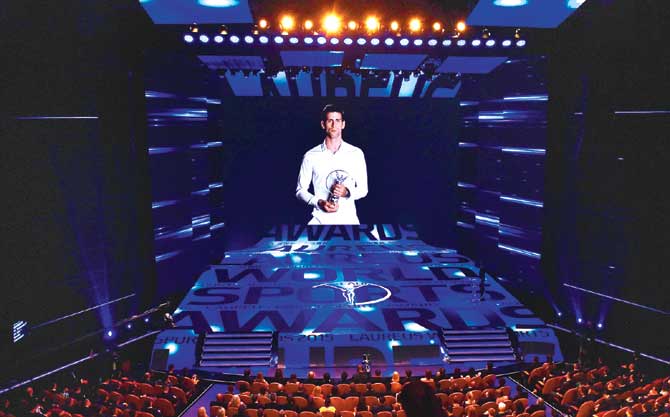 Tennis ace Novak Djokovic addresses the star-studded audience via a video-conference after winning the Laureus World Sportsman of the Year award inShanghai last night