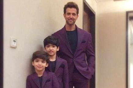 Check out this pic of Hrithik Roshan with his kids in purple suits!