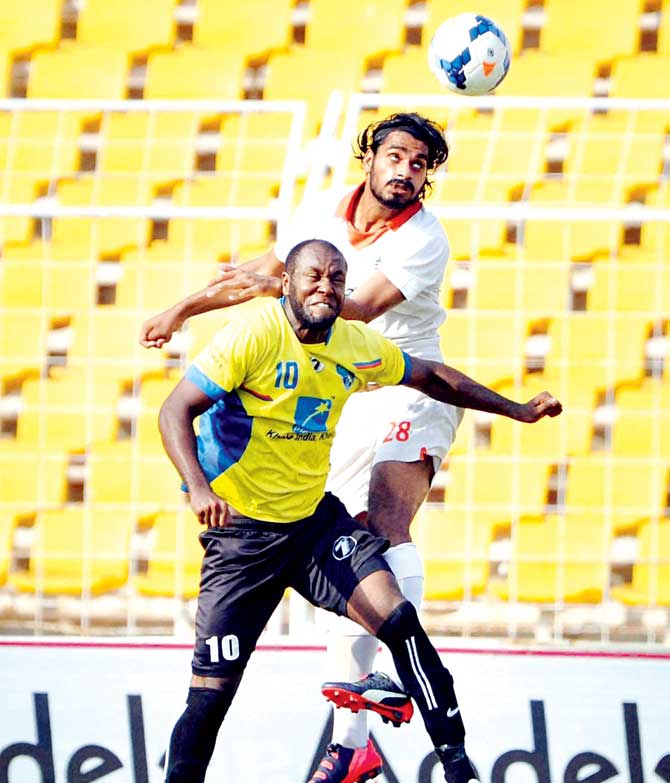 Sporting and Mumbai FC (left) players vie for the ball in an I-League match at Nehru Stadium, Fatorda yesterday. Pic/PTI