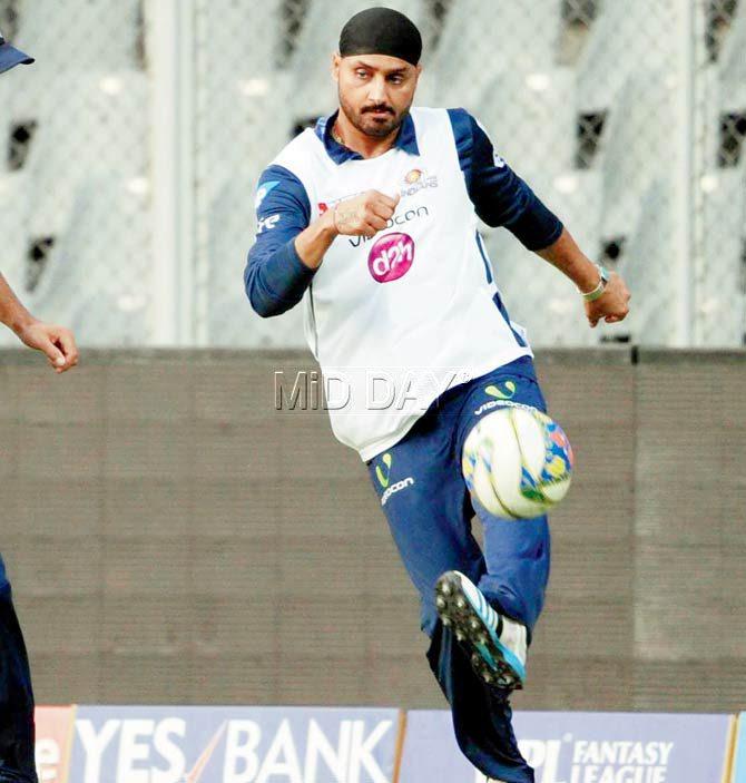 Harbhajan Singh plays football while training at Wankhede yesterday. pic/suresh KK
