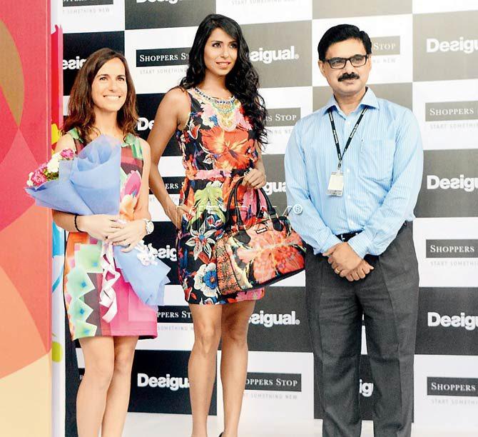 (L-R): Anna Carbonell, Desigual brand head, Asia Pacific Region, with model Candice Pinto and Salil Nair, CEO, Shoppers Stop Ltd. 