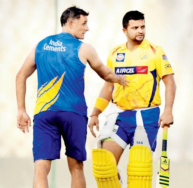 CSK’s Suresh Raina (right) with Michael Hussey during a practice session in Chennai recently