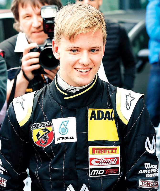 Mick Schumacher, the son of F1 legend Michael Schumacher, is all smiles on being adjudged the best rookie after the first race of the ADAC Formula Four championship in Oschersleben, Germany on Saturday. Pic/AFP