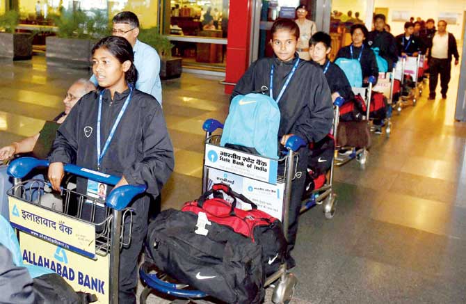 The India under-14 girls football team arrives in New Delhi from earthquake-hit Nepal yesterday. Pic/PTI 