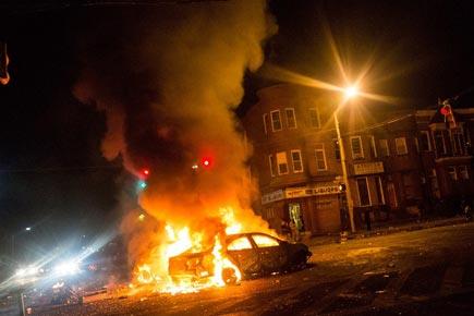 US town of Baltimore erupts into violence over black man's death
