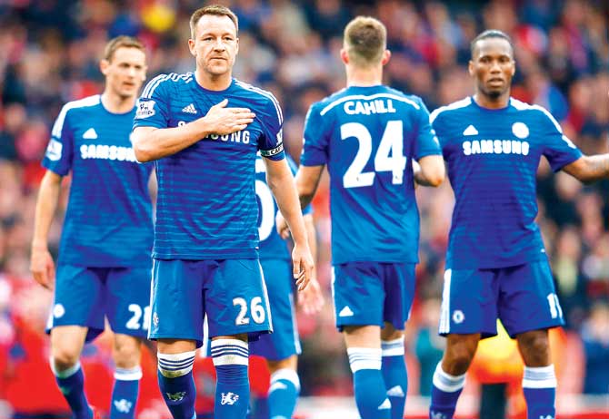 Chelsea skipper John Terry (second from left) with his teammates during an EPL match. Pic/Getty Images