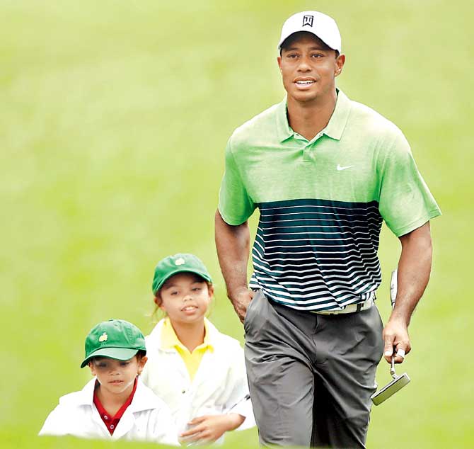 Tiger Woods with his children Charlie Axel (left) and Sam Alexis during the recently-concluded Augusta Masters in Georgia. Pic/AFP