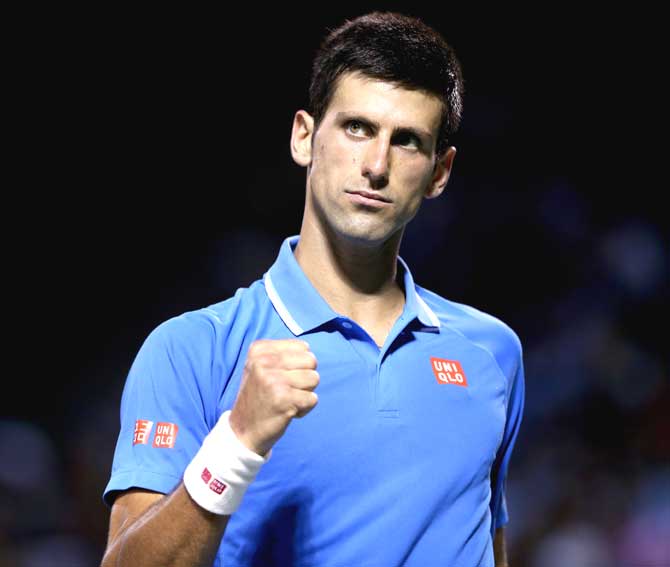 Novak Djokovic of Serbia celebrates a point against David Ferrer of Spain during day 11 of the Miami Open Presented by Itau at Crandon Park Tennis Center in Key Biscayne, Florida. Pic/AFP