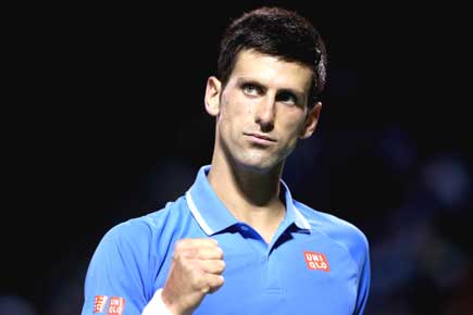 Miami Open: Djokovic holds off Ferrer to book Isner semis clash