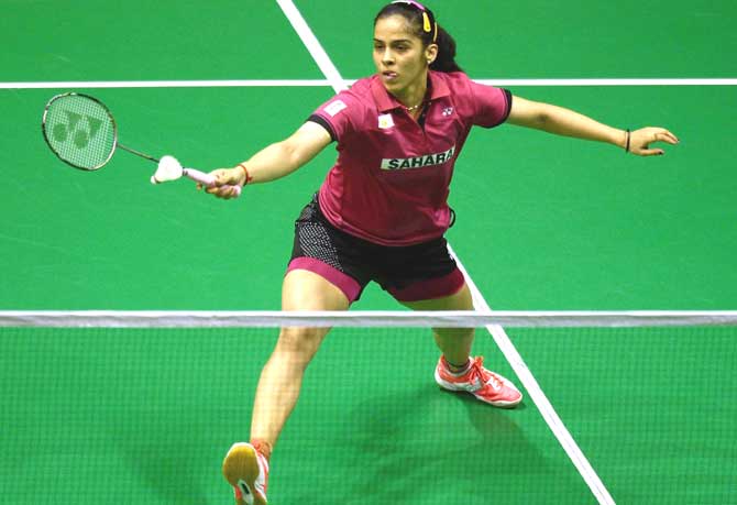 Saina Nehwal of India returns a shot against China