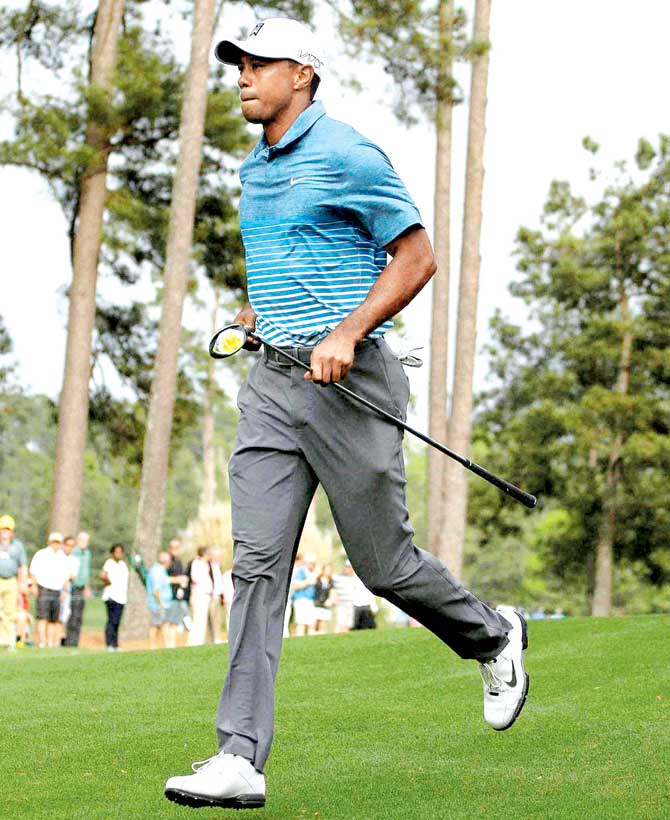 Tiger Woods runs to the 7th tee during practice for the Masters on Monday in Augusta. Pic: AP/PTI