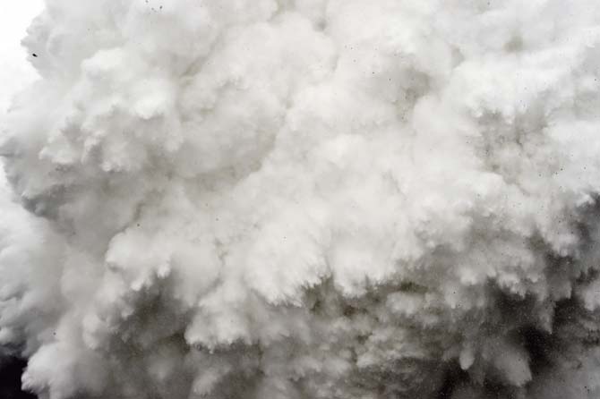 This picture taken by AFP photographer Roberto Schmidt shows an enormous cloud of snow and debris cascading down towards Everest Base Camp, moments ahead of flattening part of the camp in the Himalayas on Saturday