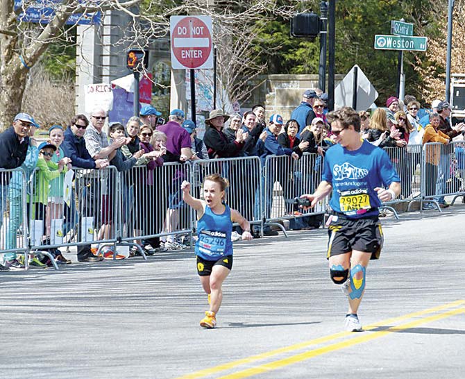 Juli Windsor and David Abel running in the Boston Marathon 2014
