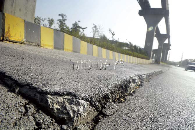 The cracks on the road surrounding the piers make this stretch extremely dangerous for motorists. Pics/Pradeep Dhivar