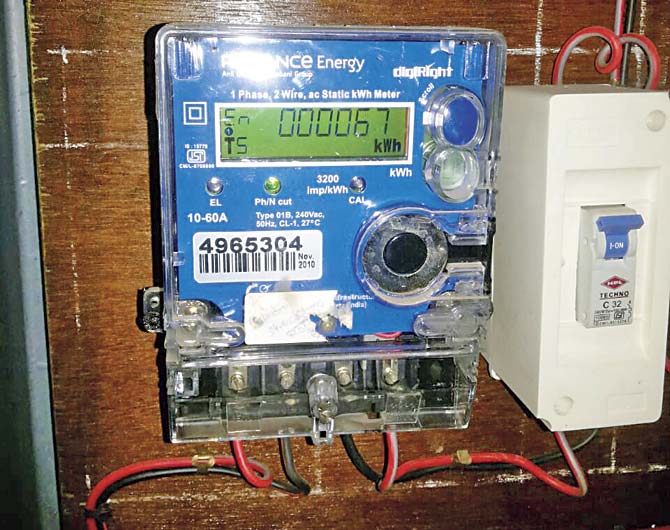 The electricity meter of the chowky, and the electricity bill, showing Abdul Shakoor Mutwali as its owner