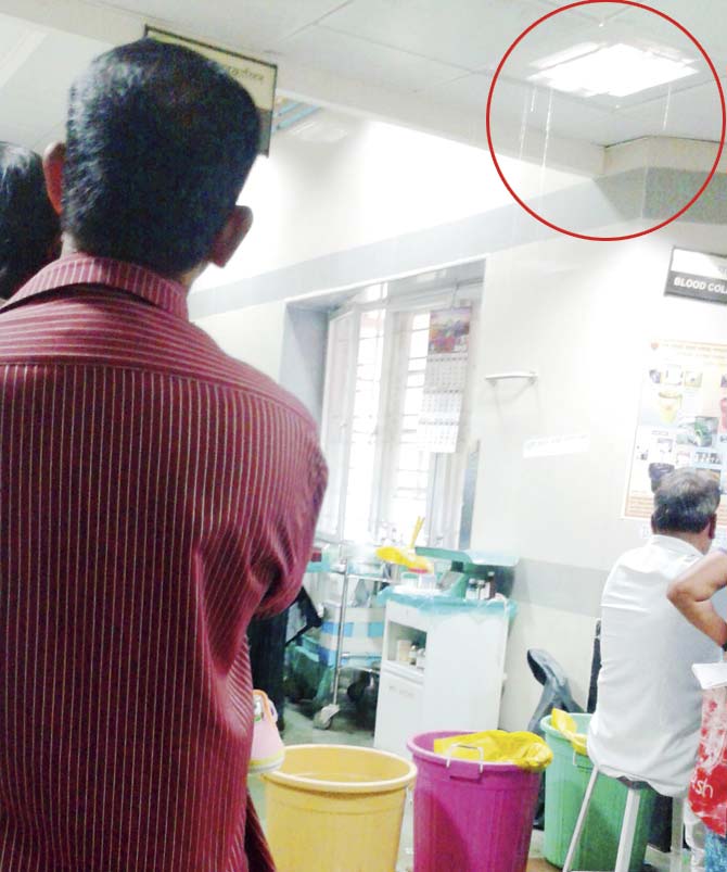 While the maintenance team only turned up the next day, the hospital staff tried to control the damage (circled) by placing buckets under the leaks