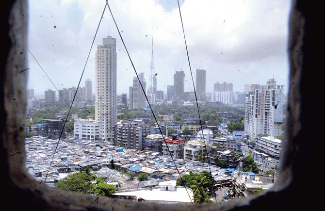 When earthquakes occur, people are supposed to evacuate buildings and head to open spaces. Activists say they wonder where people will find such open spaces in Mumbai. File pic