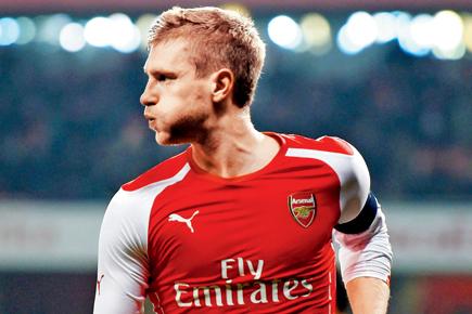 Arsenal's Mertesacker wary of Reading's physicality