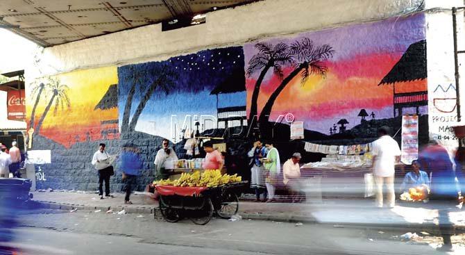 A wall of the railway bridge at Dockyard Road, which has been painted. Pic/Suresh KK