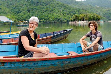 Nepal: An hour from quake epicentre, tourists enjoy boat rides, paragliding