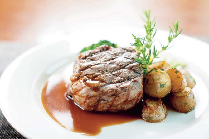 Steak with Roasted Rosemary Potatoes and Jus at Palladium Hotel