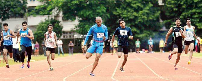Akshay Khot (third from right) wins gold in the 100m event yesterday. Pic/Atul Kamble