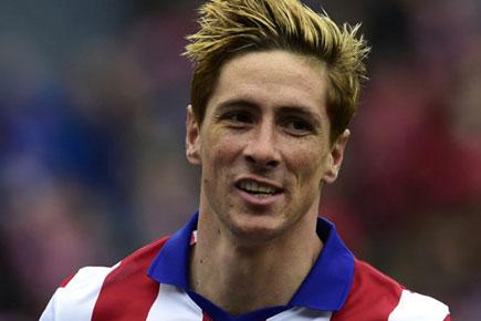Fernando Torres taken to hospital after neck injury during Atletico Madrid game