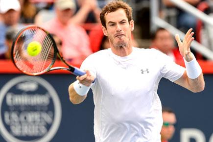 Andy Murray beats Tommy Robredo after weather delay at Montreal
