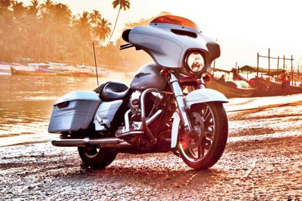 Own the road while riding Harley-Davidson's Street Glide Special