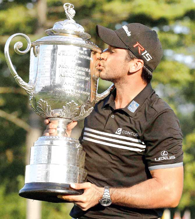 Jason Day kisses the Wanamaker Trophy after winning the PGA Championship. Pic/AFP