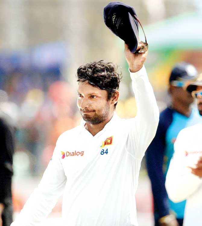 Kumar Sangakkara acknowledges the fans after Sri Lanka
