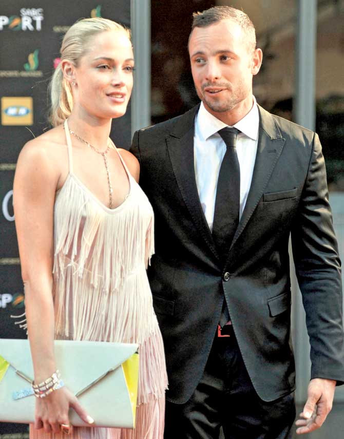 Oscar Pistorius with Reeva Steenkamp in 2012. Pic/AFP